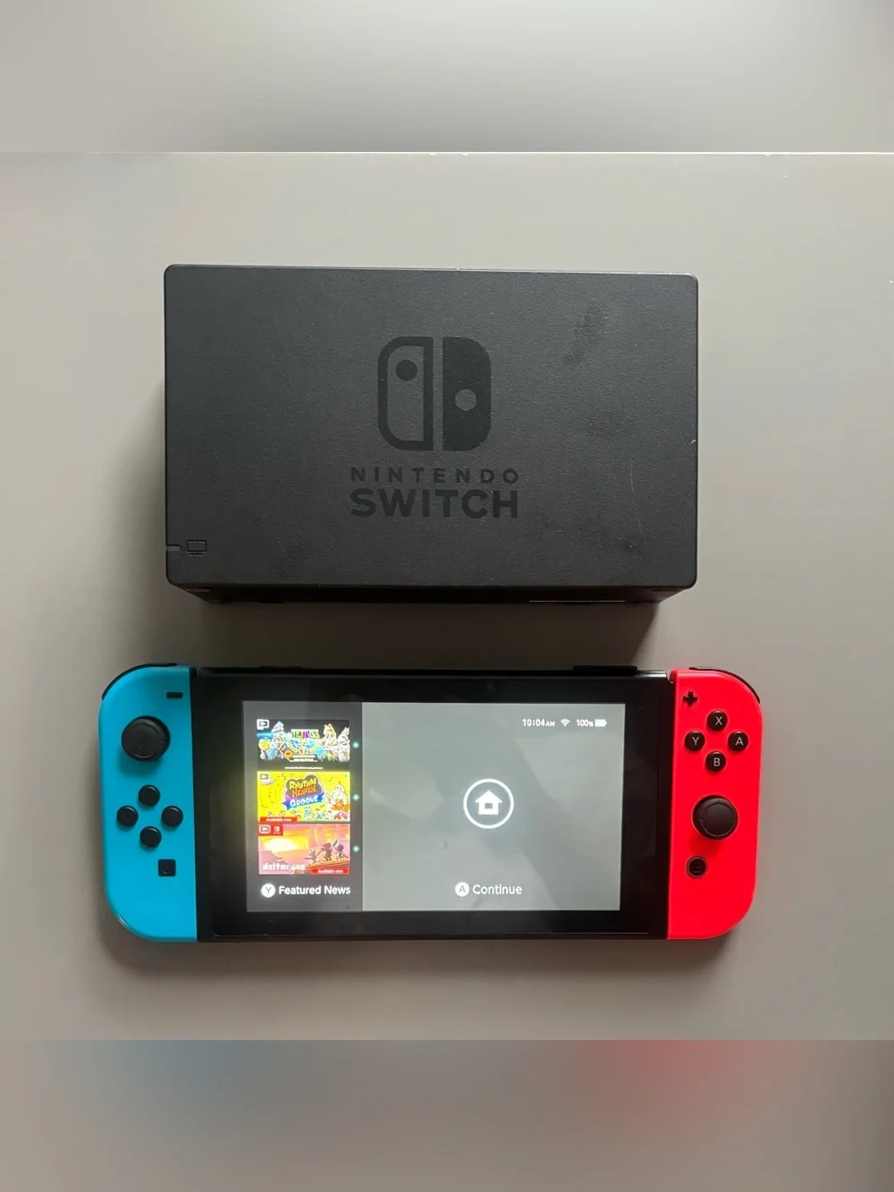 Nintendo Switch with Neon Blue & Neon Red Joy‑Con - Charging Dock, HDMI Cable
